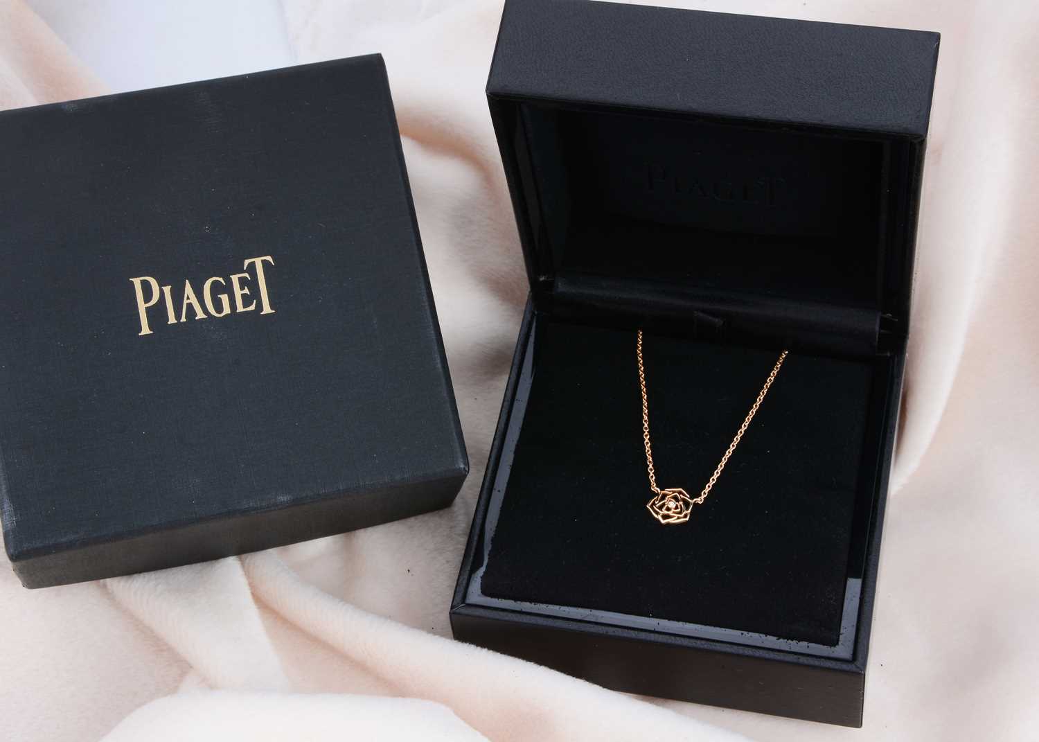 Lot 17 - A Piaget rose diamond set 18ct gold necklace and pendant