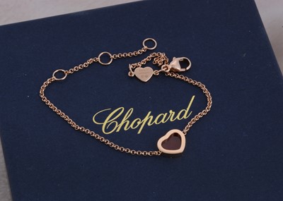 Lot 18 - A Chopard 18ct gold and carnelian heart shaped bracelet