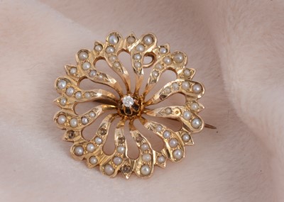 Lot 20 - An Edwardian seed pearl and diamond set brooch