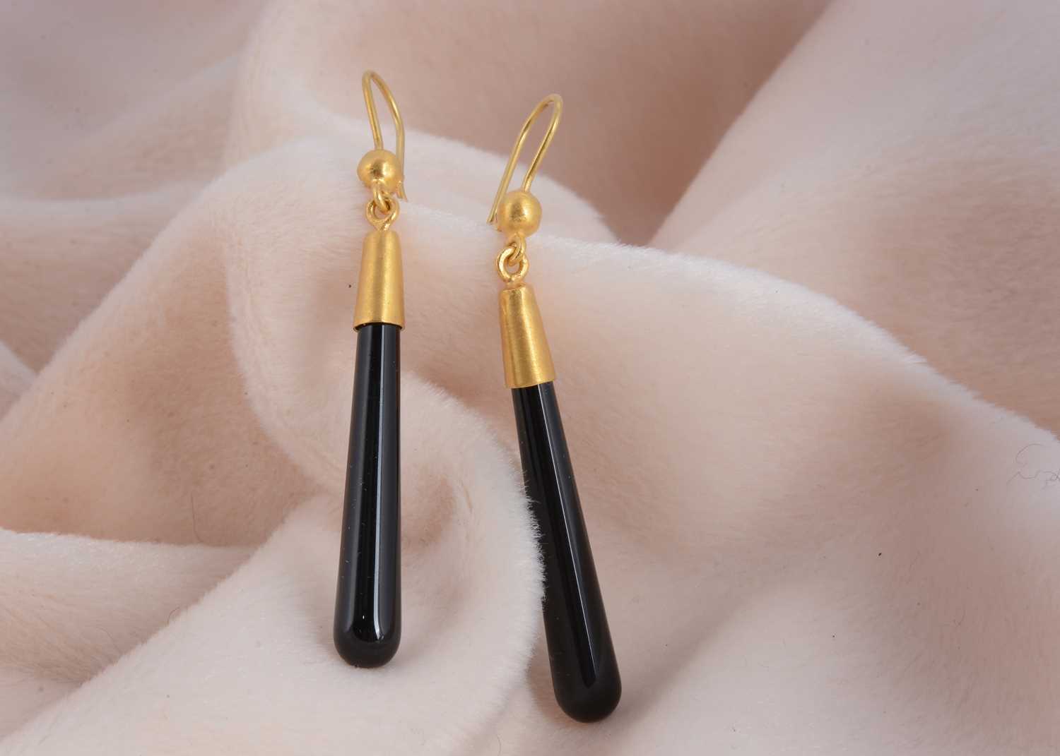 Lot 21 - A pair of Middle Eastern 24k marked onyx drop earrings