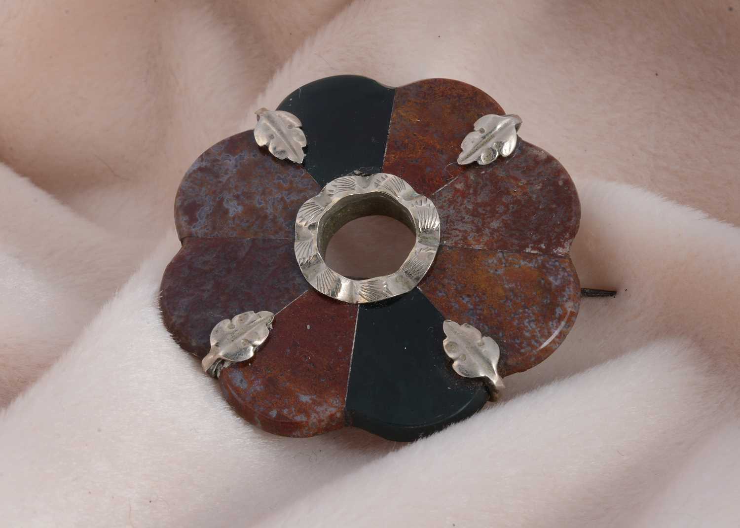Lot 23 - A 19th Century Scottish hardstone and slate mounted plaid brooch