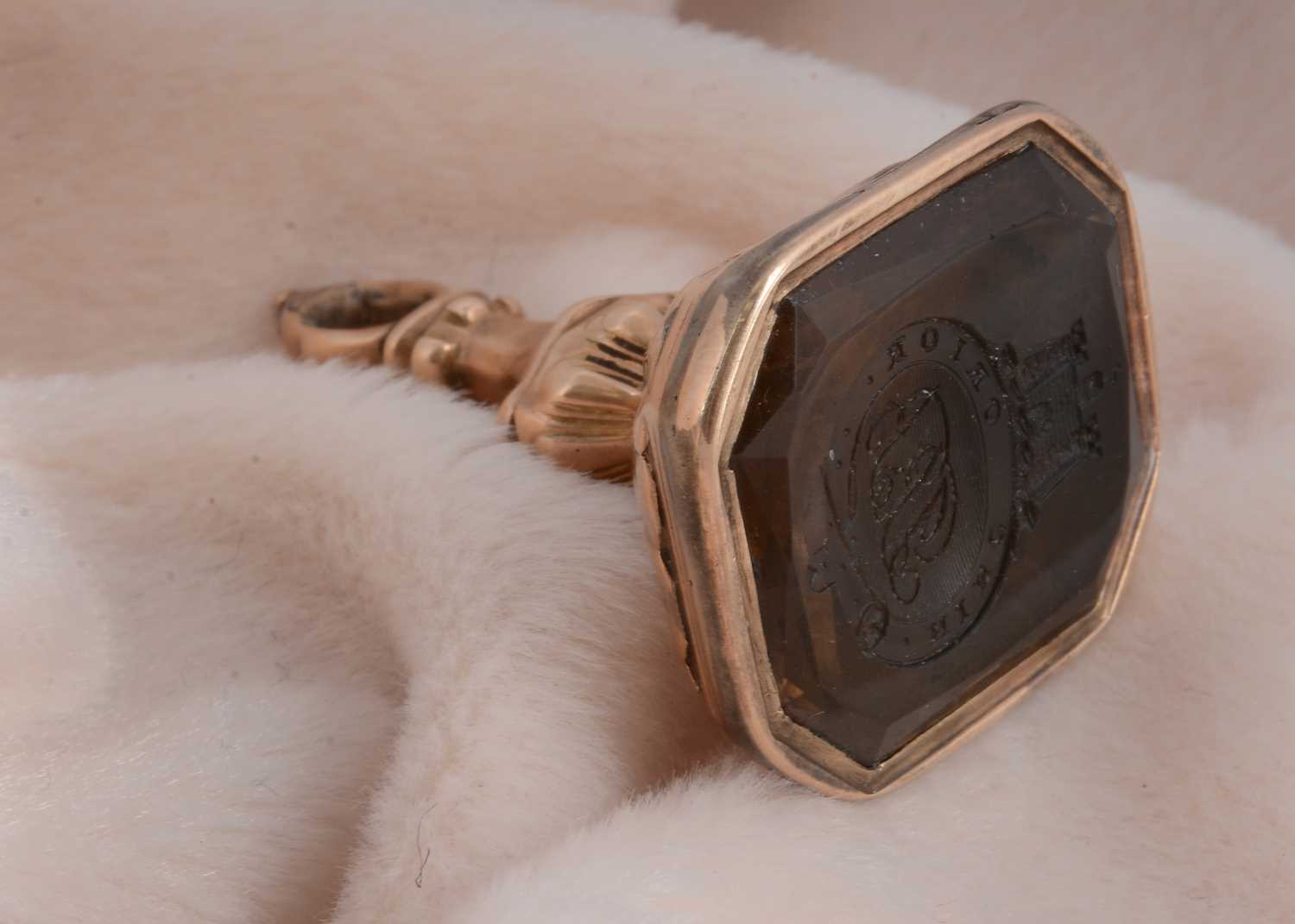 Lot 46 - A 19th Century gilt metal and smoky quartz fob