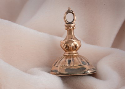 Lot 46 - A 19th Century gilt metal and smoky quartz fob