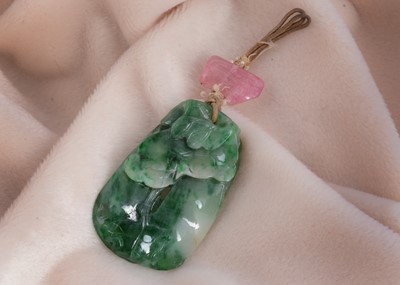 Lot 58 - A 19th Century carved Chinese jadeite jade and tourmaline pendant