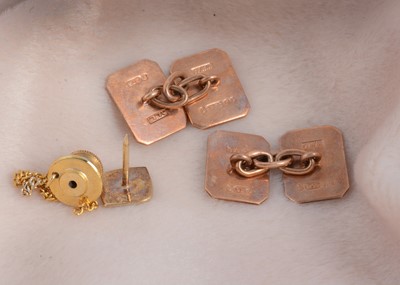 Lot 61 - A pair of 9ct gold engine turned rectangular cufflinks