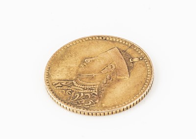 Lot 98 - A small gold coin from Tibet