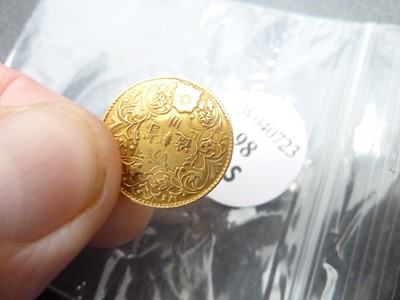 Lot 98 - A small gold coin from Tibet