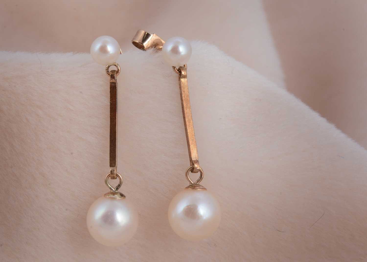 Lot 69 - A pair of 9ct gold cultured pearl drop earrings