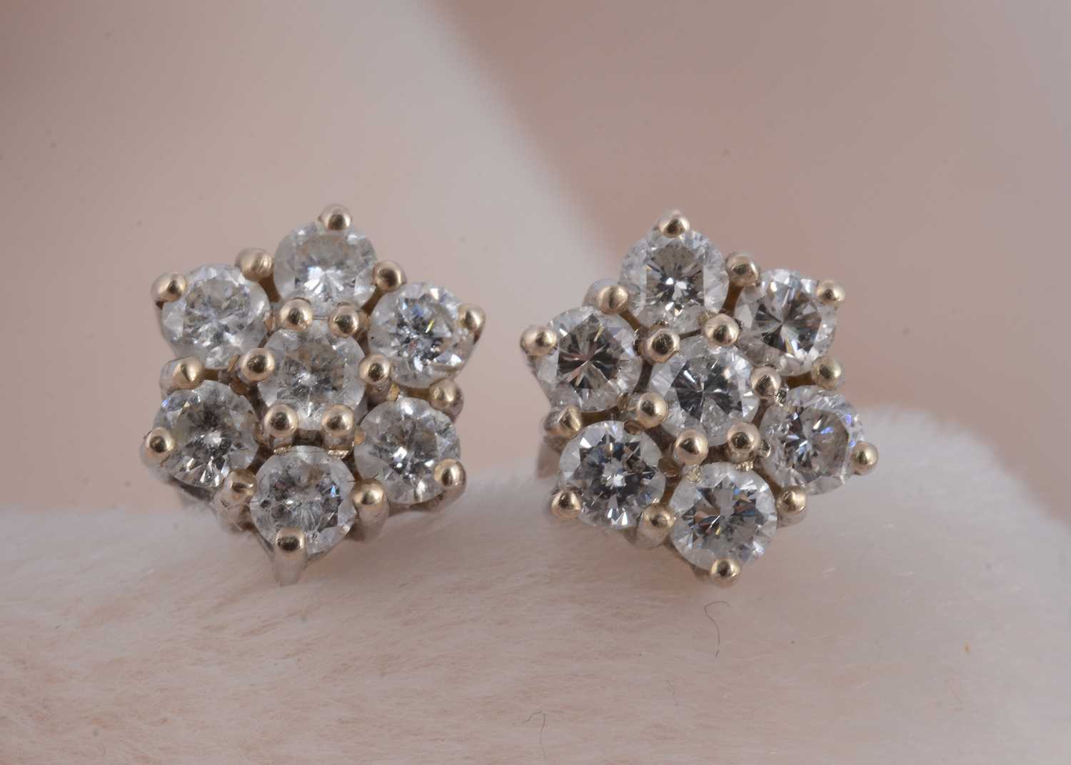Lot 72 - A pair of diamond stud cluster earrings