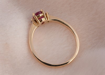 Lot 78 - A continental 18ct gold diamond and ruby dress ring