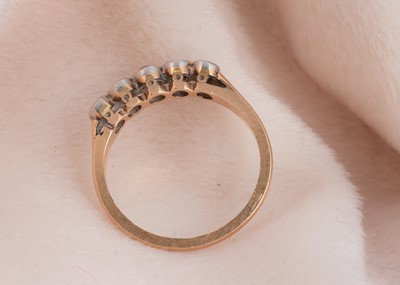 Lot 83 - A five stone diamond 18ct gold and platinum dress ring