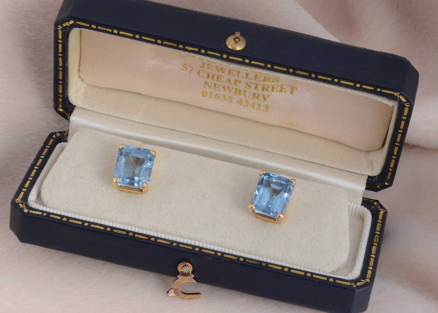 Lot 85 - A pair of 18ct gold synthetic blue spinel ear studs
