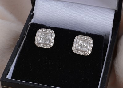 Lot 86 - A pair of diamond cluster stud earrings
