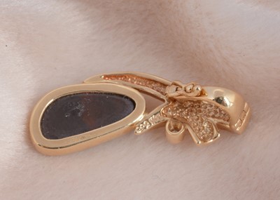 Lot 109 - A 14ct yellow gold black opal and diamond set pendant