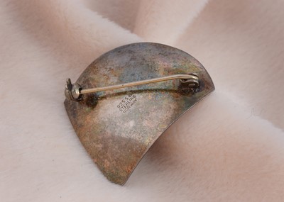 Lot 111 - A Norwegian silver and enamel triangular shaped brooch