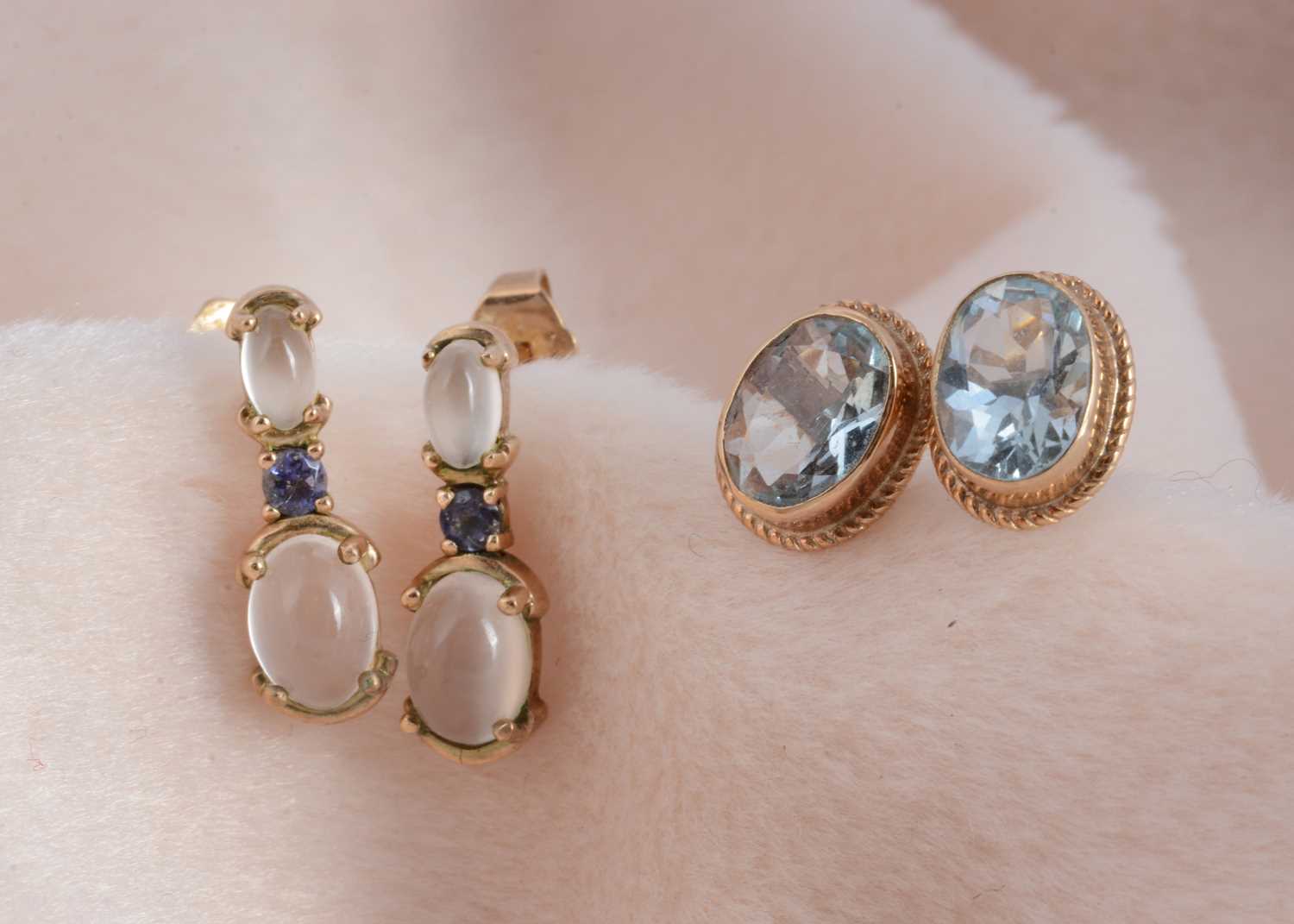 Lot 113 - A pair of 9ct gold oval topaz ear studs