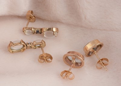 Lot 113 - A pair of 9ct gold oval topaz ear studs