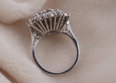 Lot 126 - A large continental white gold diamond cluster dress ring