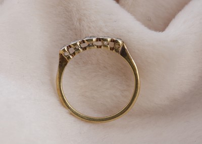Lot 140 - An Edwardian 18ct gold five stone diamond dress ring