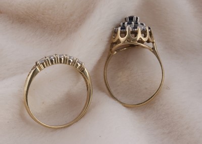 Lot 148 - A sapphire and diamond 9ct gold cluster ring
