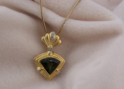 Lot 160 - An 18ct gold diamond and tourmaline pendant and chain