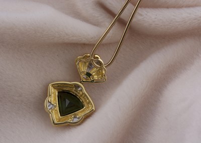 Lot 160 - An 18ct gold diamond and tourmaline pendant and chain