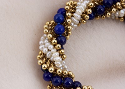 Lot 162 - A Van Cleef & Arpels 18ct gold seed pearl and lapis lazuli twist necklace