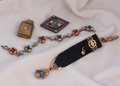 Lot 175 - An art nouveau silk gilt metal and paste fob pendant