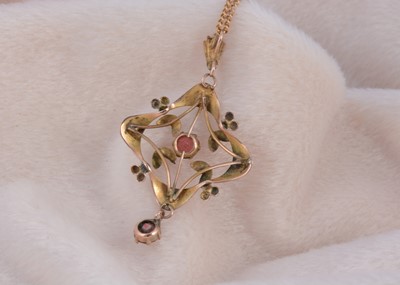 Lot 184 - An art nouveau 9ct gold paste set pierced pendant