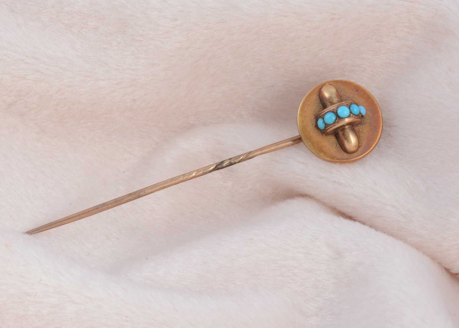 Lot 186 - A 19th Century turquoise and yellow metal stick pin