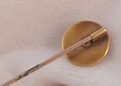 Lot 186 - A 19th Century turquoise and yellow metal stick pin