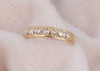 Lot 196 - An 18ct gold five stone diamond set dress ring