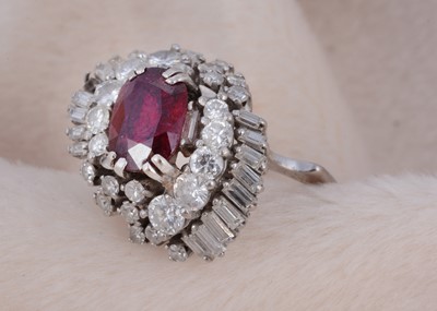 Lot 215 - An 18ct gold ruby and diamond cocktail ring
