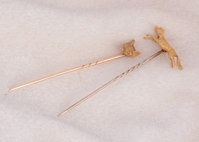 Lot 220 - Two hunting yellow metal stick or stock pins