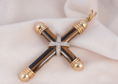 Lot 221 - A tiger's eye and 14ct gold diamond set cross pendant