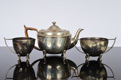 Lot 230 - A George V silver three piece tea set by Henry Wilkinson
