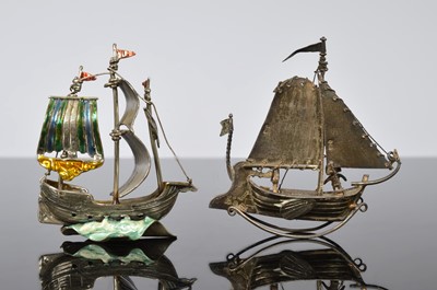 Lot 248 - Two small silver models of boats