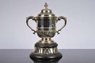 Lot 261 - A late Victorian silver twin handled covered Tennis trophy cup on stand