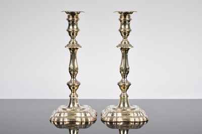 Lot 263 - A pair of Edwardian silver filled candlesticks by Fordham & Faulkner