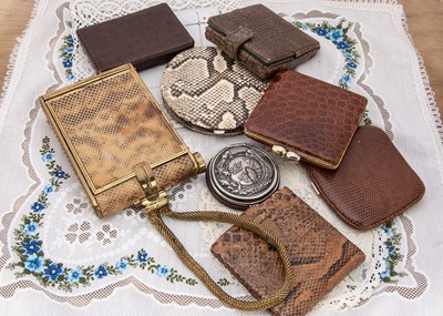 Lot 303 - Snake and other skin compacts