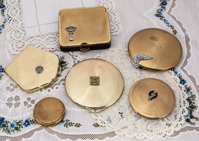 Lot 309 - Continental gilt metal compacts