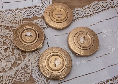 Lot 322 - Four Swiss gilt metal circular fob watch style compacts