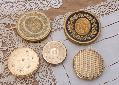 Lot 323 - Five circular gilt metal Elizabeth Arden compacts