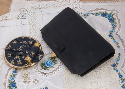 Lot 331 - A vintage black cloth  A frame carryall