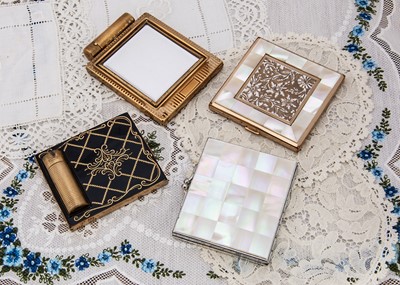 Lot 333 - Four 1950s Agme compacts