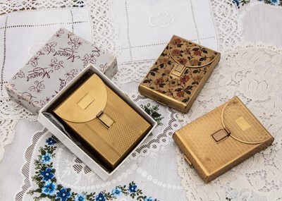 Lot 338 - Three rectangular gilt metal engine turned Mascot cigarette and powder compacts