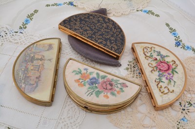 Lot 344 - Four lunette shaped compacts