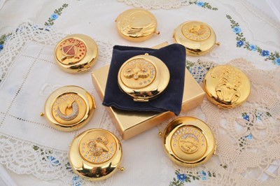 Lot 350 - Estee Lauder 2000 signs of the Zodiac circular compacts