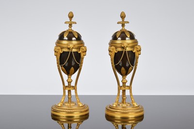 Lot 354 - A pair of Regency period bronze and ormolu candle holders