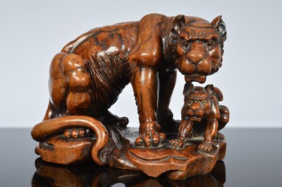 Lot 361 - A 19th century carved burr walnut animal group